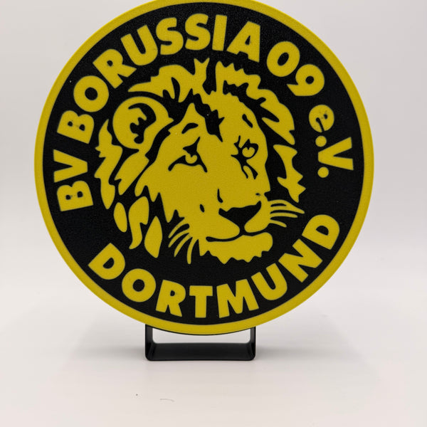 „Schwarz-gelbe Borussia-Dortmund-Lampe mit stilisiertem Löwenbild.“