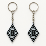 Borussia Mönchengladbach Schlüsselanhänger aus PLA 3D-Druck in Schwarz und Weiß auf hellem Hintergrund