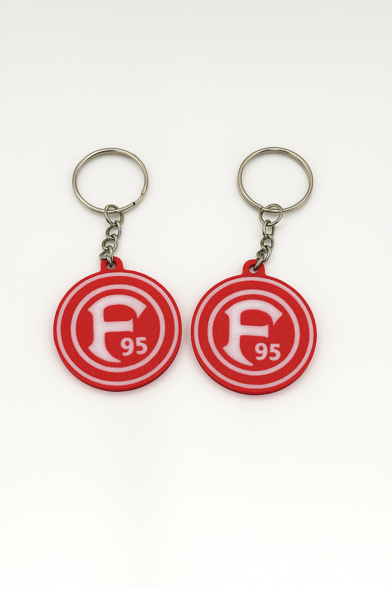 Fortuna Düsseldorf Schlüsselanhänger aus PLA 3D-Druck in Rot und Weiß auf weißem