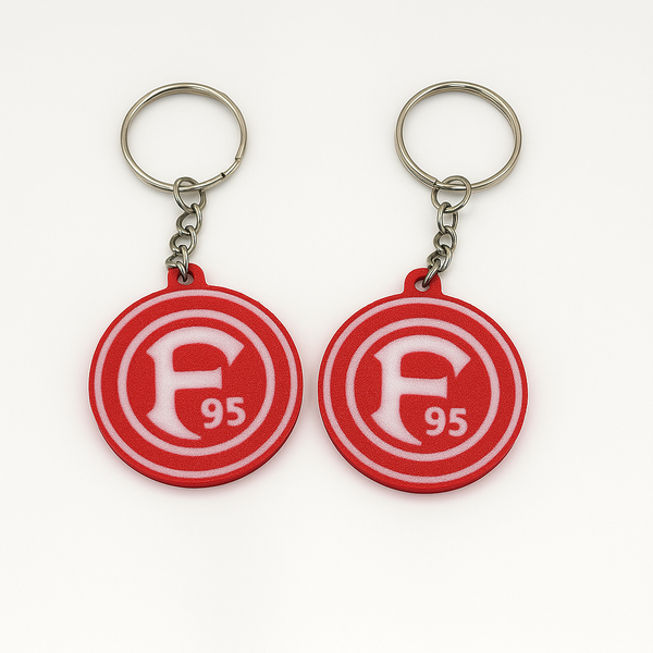 Fortuna Düsseldorf Schlüsselanhänger aus PLA 3D-Druck in Rot und Weiß auf weißem