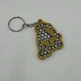 Luxuriöser Schlüsselanhänger mit goldener Optik, inspiriert vom legendären Lamborghini-Bullen