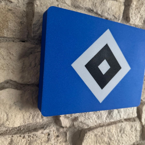 „Dekorative HSV-Lampe als stilvolles Leuchtelement für Fanräume.“