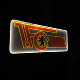 „Leuchtende Union-Berlin-Lampe in Rot und Gelb mit Vereinslogo.“